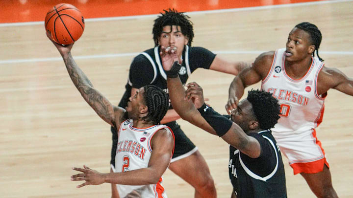 Clemson guard Dillon Hunter (2) drives to the basket against the South Carolina Gamecocks. Clemson guard Dillon Hunter (2) drives to the basket against the South Carolina Gamecocks.