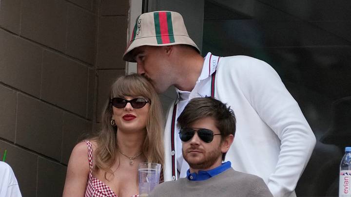 Taylor Swift and Travis Kelce look on during the men's singles final of the 2024 U.S. Open tennis tournament.