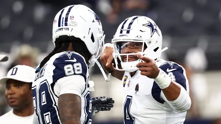Dallas Cowboys quarterback Dak Prescott speaks with Ceedee Lamb during warmups before a game against the Washington Commanders Dallas Cowboys quarterback Dak Prescott speaks with Ceedee Lamb during warmups before a game against the Washington Commanders