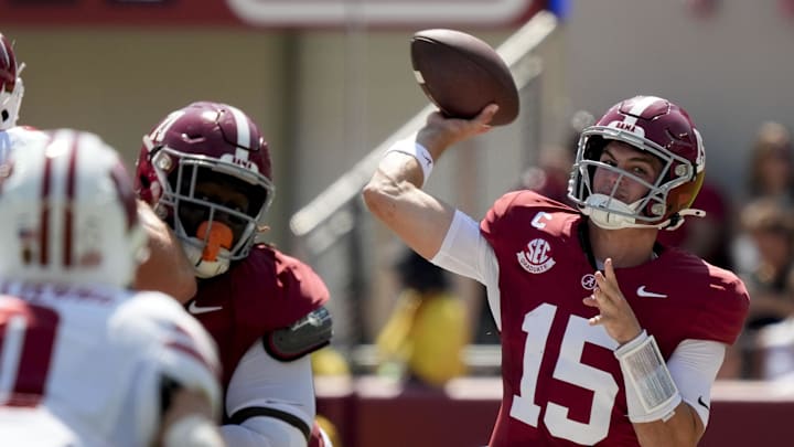 Sep 13, 2025; Tuscaloosa, Alabama, USA;  Alabama quarterback Ty Simpson (15) throws a pass against Wisconsin that was caught by Alabama wide receiver Germie Bernard (5) and run for a touchdown against Wisconsin at Saban Field at Bryant-Denny Stadium