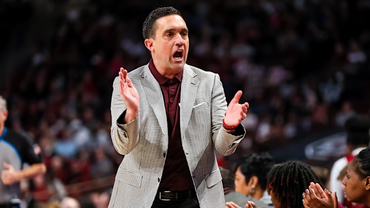 Jan 7, 2024; Columbia, South Carolina, USA; Mississippi State Bulldogs head coach Sam Purcell celebrates a play against the South Carolina Gamecocks in the first half at Colonial Life Arena. Mandatory Credit: Jeff Blake-Imagn Images