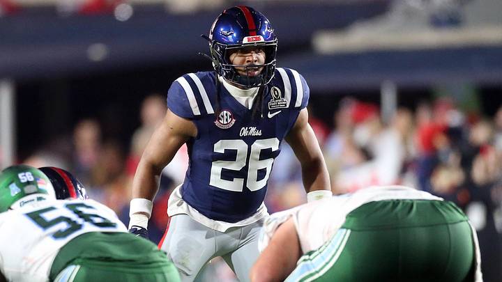 Dec 20, 2025; Oxford, MS, USA; Mississippi Rebels linebacker Tahj Chambers (26) waits for the snap during the fourth quarter against the Tulane Green Wave at Vaught-Hemingway Stadium. Mandatory Credit: Petre Thomas-Imagn Images Dec 20, 2025; Oxford, MS, USA; Mississippi Rebels linebacker Tahj Chambers (26) waits for the snap during the fourth quarter against the Tulane Green Wave at Vaught-Hemingway Stadium. Mandatory Credit: Petre Thomas-Imagn Images