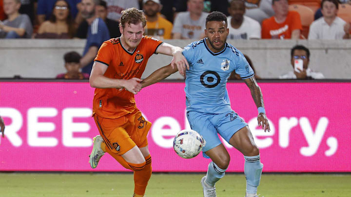 Jul 23, 2022; Houston, Texas, USA; Houston Dynamo FC forward Thor Ulfarsson (34) and Minnesota