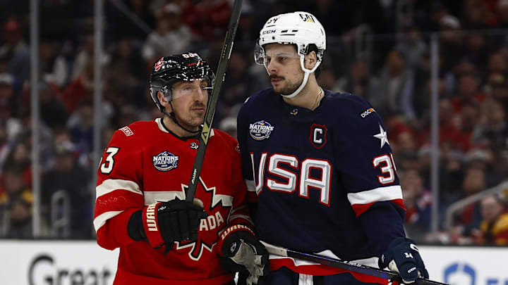 Feb 20, 2025; Boston, MA, USA; [Imagn Images direct customers only] Team Canada forward Brad Marchand (63) and United States forward Auston Matthews (34) during the 4 Nations Face-Off ice hockey championship game at TD Garden. Mandatory Credit: Winslow Townson-Imagn Images