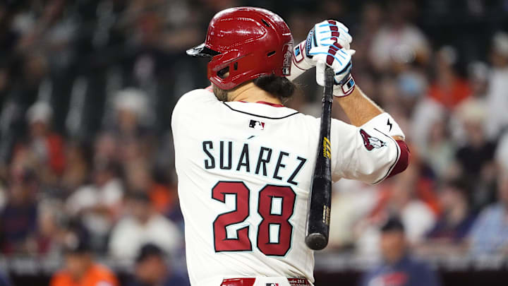 Arizona Diamondbacks' Eugenio Suarez bats against the Houston Astros in the first inning at Chase Field in Phoenix on July 23, 2025.