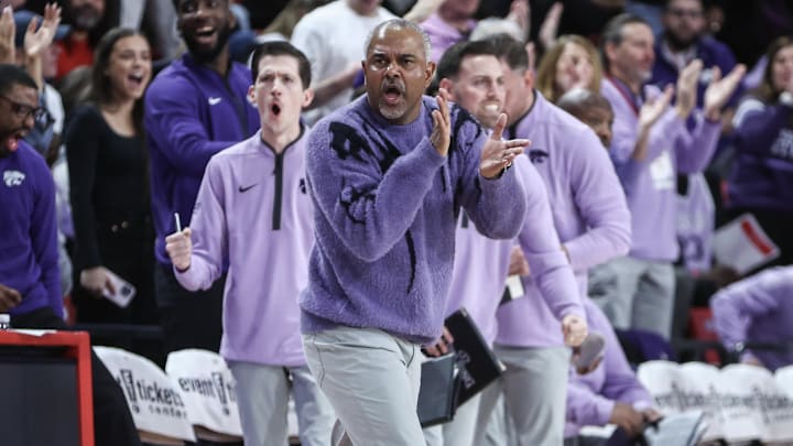 Dec 7, 2024; Queens, New York, USA;  Kansas State Wildcats head coach Jerome Tang applauds during a timeout in the first half against the St. John's Red Storm at Carnesecca Arena. Mandatory Credit: Wendell Cruz-Imagn Images