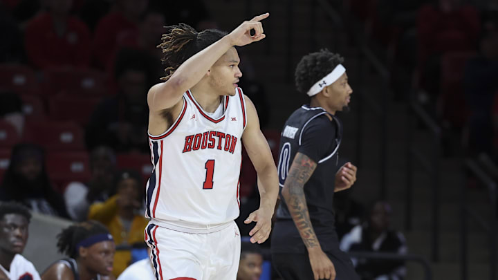 Dec 10, 2025; Houston, Texas, USA; Houston Cougars guard Isiah Harwell (1) reacts after scoring a basket during the first half against the Jackson State Tigers at Fertitta Center.