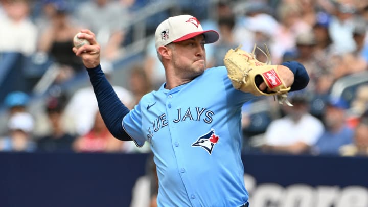 Jul 4, 2024; Toronto, Ontario, CAN; Toronto Blue Jays relief pitcher Trevor Richards (33) delivers a pitch against the Houston Astros in the seventh inning at Rogers Centre. Jul 4, 2024; Toronto, Ontario, CAN; Toronto Blue Jays relief pitcher Trevor Richards (33) delivers a pitch against the Houston Astros in the seventh inning at Rogers Centre.