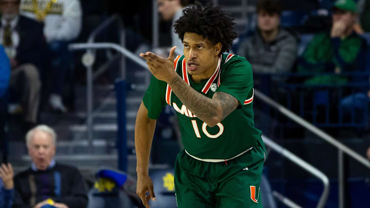 Jan 13, 2026; South Bend, Indiana, USA;  Miami (FL) Hurricanes guard Tru Washington (10) celebrates a 3-point shot against the Notre Dame Fighting Irish during the first half at Purcell Pavilion at the Joyce Center. Mandatory Credit: Michael Caterina-Imagn Images