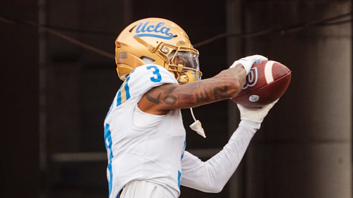 Nov 2, 2024; Lincoln, Nebraska, USA; UCLA Bruins wide receiver Kwazi Gilmer (3) warms up before a game against the Nebraska Cornhuskers at Memorial Stadium. Mandatory Credit: Dylan Widger-Imagn Images