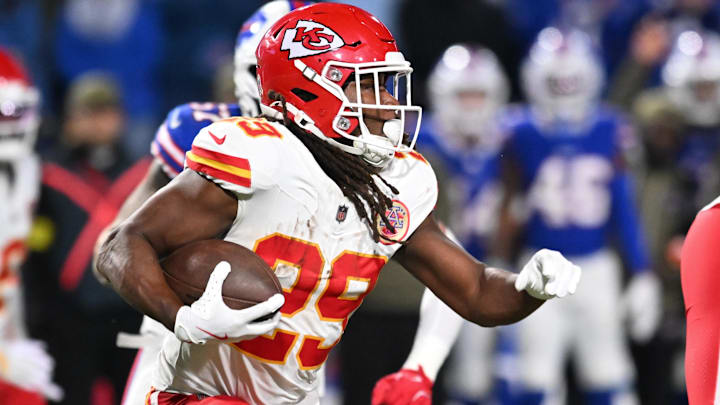Nov 2, 2025; Orchard Park, New York, USA; Kansas City Chiefs running back Kareem Hunt (29) runs with the ball in the second half against the Buffalo Bills at Highmark Stadium. Mandatory Credit: Mark Konezny-Imagn Images