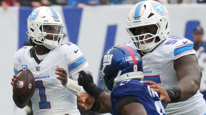 Sep 27, 2026; East Rutherford, New Jersey, USA;  Tennessee Titans quarterback Cam Ward (1) passes the ball against the New York Giants during the first quarter at MetLife Stadium.  Mandatory Credit: Robert Deutsch-Imagn Images