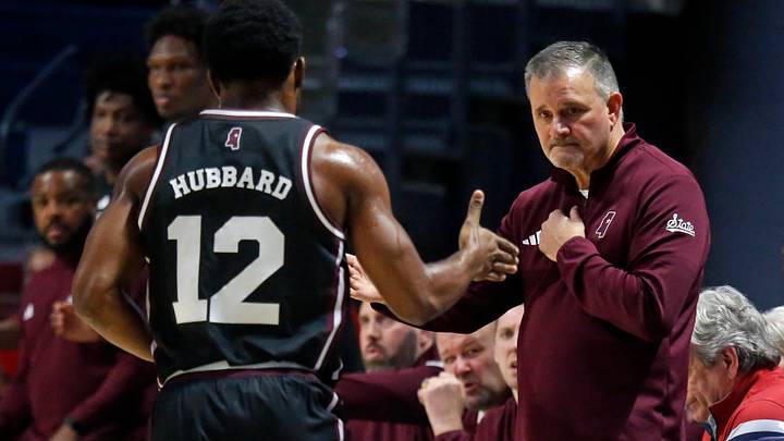 Mississippi State Bulldogs head coach Chris Jans reacts with guard Josh Hubbard (12) as he checks out of the game during the first half against the Mississippi Rebels at The Sandy and John Black Pavilion at Ole Miss. Mississippi State Bulldogs head coach Chris Jans reacts with guard Josh Hubbard (12) as he checks out of the game during the first half against the Mississippi Rebels at The Sandy and John Black Pavilion at Ole Miss.