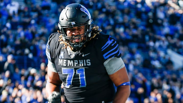 Memphis' Xavier Hill (71) celebrates after the team scored a touchdown during the game between Southern Methodist University and University of Memphis at Simmons Bank Liberty Stadium in Memphis, Tenn., on Saturday, November 18, 2023. Memphis' Xavier Hill (71) celebrates after the team scored a touchdown during the game between Southern Methodist University and University of Memphis at Simmons Bank Liberty Stadium in Memphis, Tenn., on Saturday, November 18, 2023.