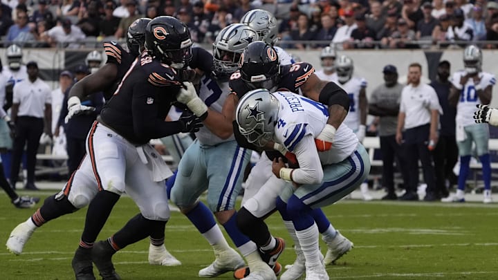 Chicago Bears defensive end Montez Sweat sacks Dallas Cowboys quarterback Dak Prescott.