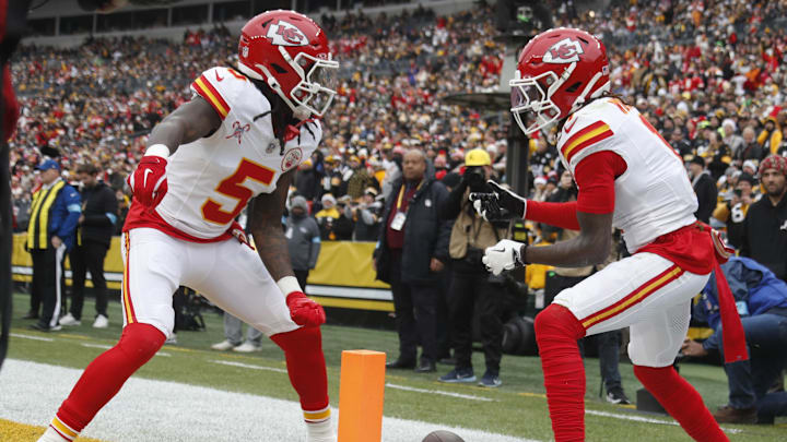 Dec 25, 2024; Pittsburgh, Pennsylvania, USA;  Kansas City Chiefs wide receiver Xavier Worthy (right) celebrates his touchdown with wide receiver Hollywood Brown (5) against the Pittsburgh Steelers during the first quarter at Acrisure Stadium. Mandatory Credit: Charles LeClaire-Imagn Images