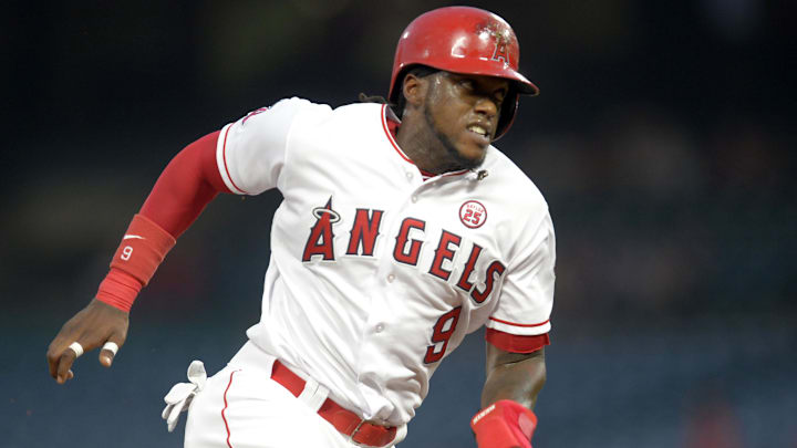 August 29, 2017; Anaheim, CA, USA; Los Angeles Angels left fielder Cameron Maybin (9) reaches home to score a run in the first inning against the Oakland Athletics at Angel Stadium of Anaheim. Mandatory Credit: Gary A. Vasquez-Imagn Images August 29, 2017; Anaheim, CA, USA; Los Angeles Angels left fielder Cameron Maybin (9) reaches home to score a run in the first inning against the Oakland Athletics at Angel Stadium of Anaheim. Mandatory Credit: Gary A. Vasquez-Imagn Images