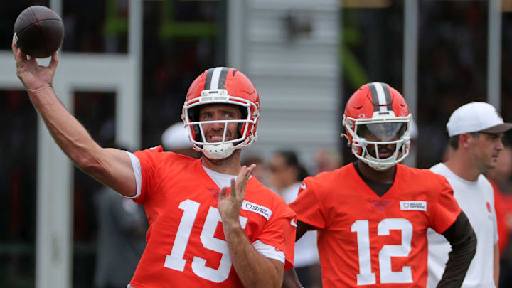Joe Flacco throws as Shedeur Sanders looks on during Browns training camp July 25, 2025, in Berea, Ohio.