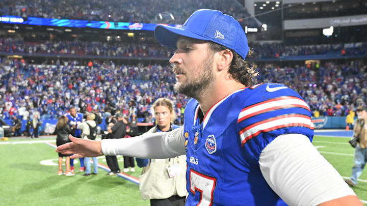 Sep 7, 2025; Orchard Park, New York, USA;  Buffalo Bills quarterback Josh Allen (17) celebrates placekicker Matt Prater (15) (not pictured) field goal to win against the Baltimore Ravens during the fourth quarter  at Highmark Stadium. Mandatory Credit: Mark Konezny-Imagn Images