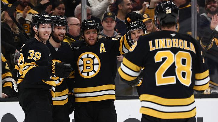 Dec 18, 2025; Boston, Massachusetts, USA; Boston Bruins center Pavel Zacha (18) (second from left) celebrates his goal with center Morgan Geekie (39) and right wing David Pastrnak (88) during the first period against the Edmonton Oilers at TD Garden. Mandatory Credit: Winslow Townson-Imagn Images Dec 18, 2025; Boston, Massachusetts, USA; Boston Bruins center Pavel Zacha (18) (second from left) celebrates his goal with center Morgan Geekie (39) and right wing David Pastrnak (88) during the first period against the Edmonton Oilers at TD Garden. Mandatory Credit: Winslow Townson-Imagn Images