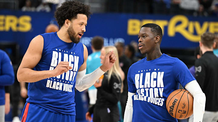 Feb 9, 2025; Detroit, Michigan, USA; Detroit Pistons guard Cade Cunningham (2) talks to newly acquired Pistons guard, Dennis Schroder (right):  Lon Horwedel-Imagn Images