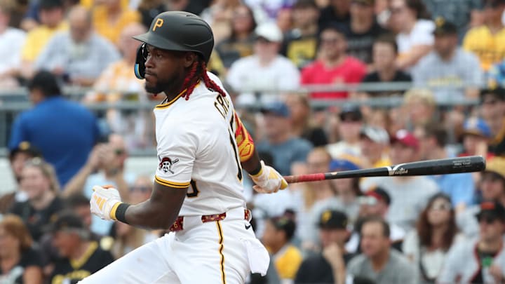 Jul 19, 2025; Pittsburgh, Pennsylvania, USA;  Pittsburgh Pirates center fielder Oneil Cruz (15) hits a triple against the Chicago White Sox during the second inning at PNC Park. Mandatory Credit: Charles LeClaire-Imagn Images