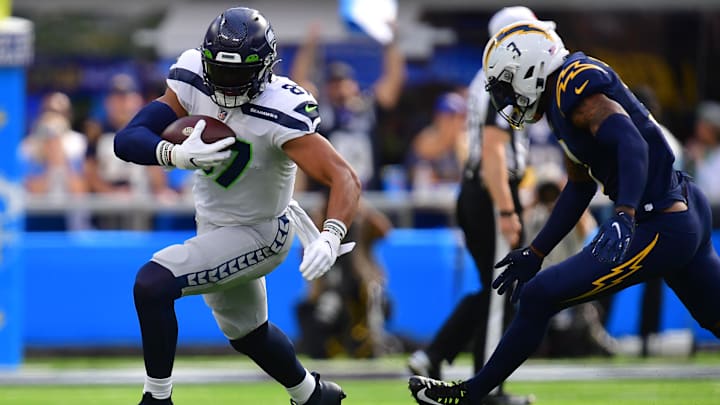 Oct 23, 2022; Inglewood, California, USA; Seattle Seahawks tight end Noah Fant (87) runs the ball against Los Angeles Chargers safety Derwin James Jr. (3) during the first half at SoFi Stadium. Oct 23, 2022; Inglewood, California, USA; Seattle Seahawks tight end Noah Fant (87) runs the ball against Los Angeles Chargers safety Derwin James Jr. (3) during the first half at SoFi Stadium.