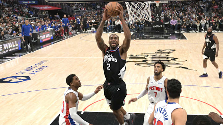 Los Angeles Clippers forward Kawhi Leonard (2) drives past Detroit Pistons guard Jaden Ivey (23) and guard Troy Brown, jr. (7) for a dunk in the second half at Crypto.com Arena. Mandatory Credit: Jayne Kamin-Oncea-Imagn Images Los Angeles Clippers forward Kawhi Leonard (2) drives past Detroit Pistons guard Jaden Ivey (23) and guard Troy Brown, jr. (7) for a dunk in the second half at Crypto.com Arena. Mandatory Credit: Jayne Kamin-Oncea-Imagn Images