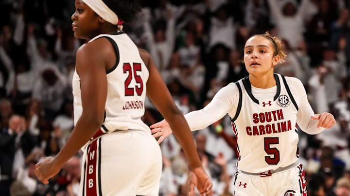Jan 15, 2026; Columbia, South Carolina, USA; South Carolina Gamecocks guard Tessa Johnson (5) celebrates a three point basket against the Texas Longhorns in the first half at Colonial Life Arena. Mandatory Credit: Jeff Blake-Imagn Images