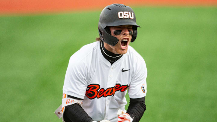 Oregon State's Travis Bazzana (37) celebrates after hitting the team's second solo home run during an NCAA college baseball game against Oregon at Goss Stadium on Friday, April 26, 2024, in Corvallis, Ore. Oregon State's Travis Bazzana (37) celebrates after hitting the team's second solo home run during an NCAA college baseball game against Oregon at Goss Stadium on Friday, April 26, 2024, in Corvallis, Ore.