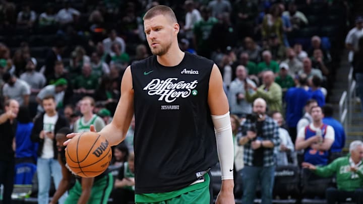 May 7, 2025; Boston, Massachusetts, USA; Boston Celtics center Kristaps Porzingis (8) warms up before the start of game two of the second round for the 2025 NBA Playoffs against the New York Knicks at TD Garden. Mandatory Credit: David Butler II-Imagn Images