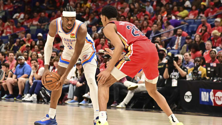 Apr 27, 2024; New Orleans, Louisiana, USA; Oklahoma City Thunder Guard Shai Gilgeous-Alexander (2) handles the ball while defended by New Orleans Pelicans Guard Trey Murphy III (25) Apr 27, 2024; New Orleans, Louisiana, USA; Oklahoma City Thunder Guard Shai Gilgeous-Alexander (2) handles the ball while defended by New Orleans Pelicans Guard Trey Murphy III (25)
