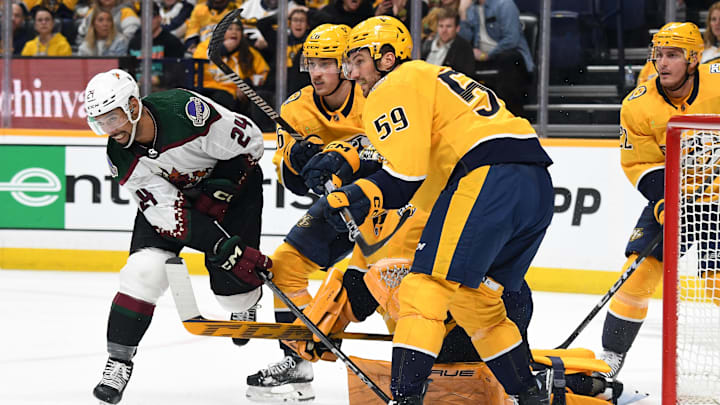 Feb 10, 2024; Nashville, Tennessee, USA; Arizona Coyotes defenseman Matt Dumba (24) has a shot