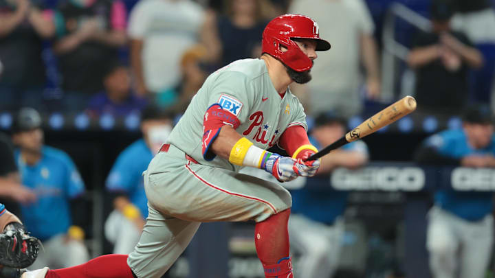 Sep 7, 2025; Miami, Florida, USA; Philadelphia Phillies designated hitter Kyle Schwarber (12) hits and RBI single against the Miami Marlins during the ninth inning at loanDepot Park. Mandatory Credit: Sam Navarro-Imagn Images Sep 7, 2025; Miami, Florida, USA; Philadelphia Phillies designated hitter Kyle Schwarber (12) hits and RBI single against the Miami Marlins during the ninth inning at loanDepot Park. Mandatory Credit: Sam Navarro-Imagn Images