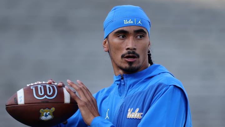 Sep 12, 2025; Pasadena, California, USA;  UCLA Bruins quarterback Nico Iamaleava (9) warms up before the game against the New Mexico Lobos at Rose Bowl. Mandatory Credit: Kiyoshi Mio-Imagn Images