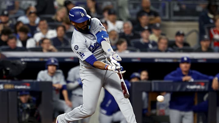Oct 30, 2024; New York, New York, USA; Los Angeles Dodgers outfielder Teoscar Hernandez (37) singles during the ninth inning against the New York Yankees in game five of the 2024 MLB World Series at Yankee Stadium.