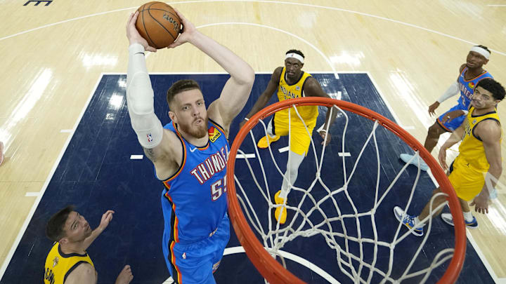 Jun 11, 2025; Indianapolis, Indiana, USA; Oklahoma City Thunder center Isaiah Hartenstein (55) dunks against the Indiana Pacers during the first half during game three of the 2025 NBA Finals at Gainbridge Fieldhouse. Mandatory Credit: Abbie Parr-Pool Photo via Imagn Images