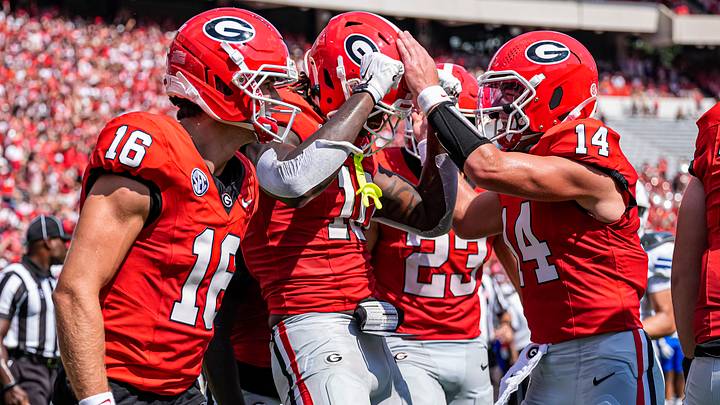 Sep 5, 2026; Athens, Georgia, USA; Georgia Bulldogs tight end Elyiss Williams (10) reacts with wide receiver London Humphreys (16) and quarterback Gunner Stockton (14) after scoring  a touchdown against the Tennessee State Tigers at Sanford Stadium. Mandatory Credit: Dale Zanine-Imagn Images