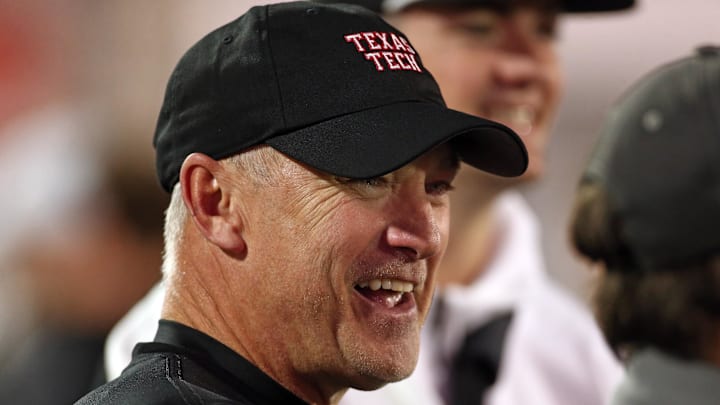 Dec 27, 2024; Memphis, TN, USA; Texas Tech Red Raiders head coach Joey McGuire looks on during warm ups prior to the game against the Arkansas Razorbacks at Simmons Bank Liberty Stadium. Mandatory Credit: Petre Thomas-Imagn Images