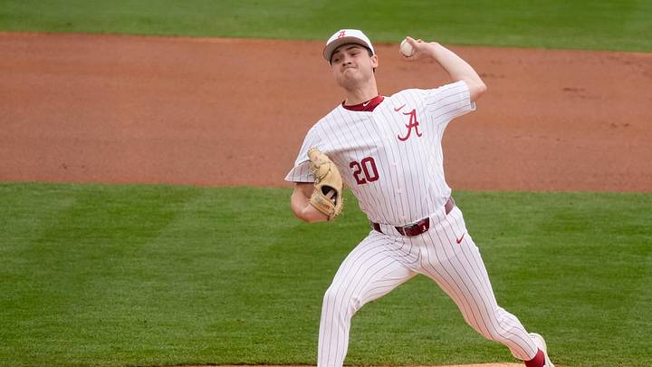 Feb 21, 2026; Tuscaloosa, AL, USA; Alabama pitcher Zane Adams (20) makes a pitch against Rhode Island at Sewell-Thomas Stadium in the first game of a Saturday double header.