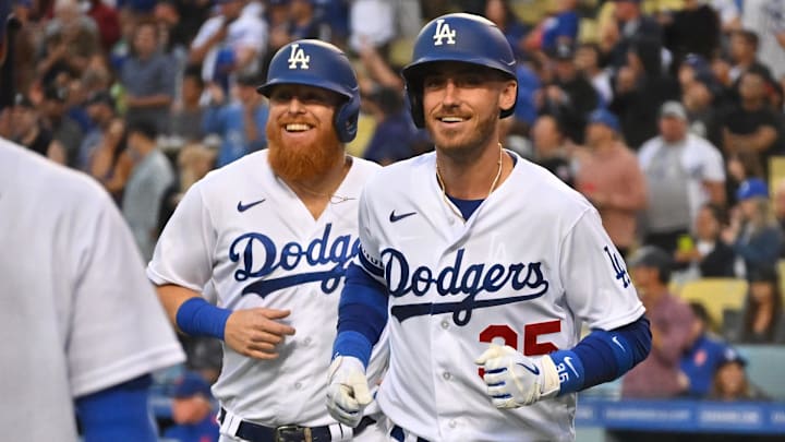 Jun 3, 2022; Los Angeles, California, USA; Los Angeles Dodgers center fielder Cody Bellinger (35) heads back to the dugout after hitting a two-run home run scoring third baseman Justin Turner (10) in the second inning against the New York Mets at Dodger Stadium. Mandatory Credit: Jayne Kamin-Oncea-Imagn Images