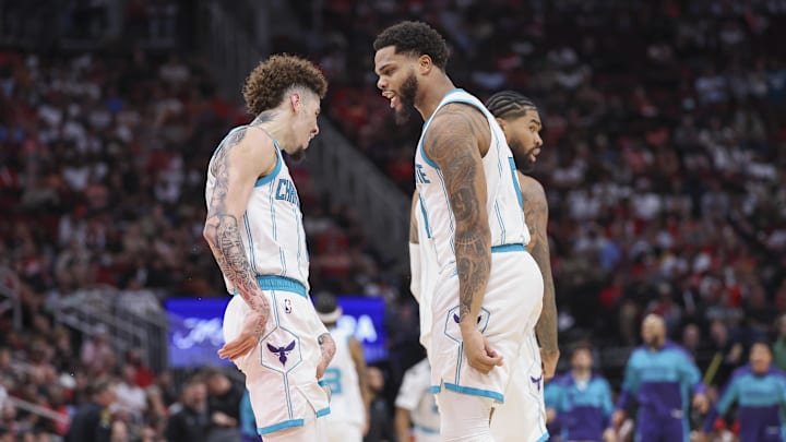 Oct 23, 2024; Houston, Texas, USA; Charlotte Hornets forward Miles Bridges (0) celebrates with guard LaMelo Ball (1) after scoring a basket during the fourth quarter against the Houston Rockets at Toyota Center. Mandatory Credit: Troy Taormina-Imagn Images Oct 23, 2024; Houston, Texas, USA; Charlotte Hornets forward Miles Bridges (0) celebrates with guard LaMelo Ball (1) after scoring a basket during the fourth quarter against the Houston Rockets at Toyota Center. Mandatory Credit: Troy Taormina-Imagn Images