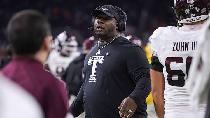 Texas A&M Aggies interim head coach Elijah Robinson on the sideline during the fourth quarter against the Oklahoma State Cowboys at NRG Stadium. Texas A&M Aggies interim head coach Elijah Robinson on the sideline during the fourth quarter against the Oklahoma State Cowboys at NRG Stadium.