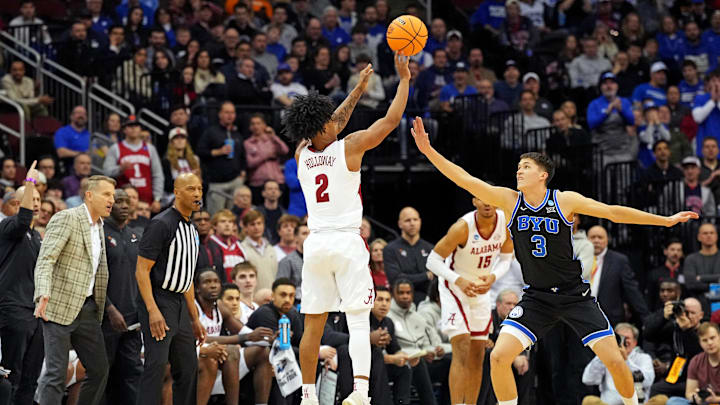 Mar 27, 2025; Newark, NJ, USA; Alabama Crimson Tide guard Aden Holloway (2) shoots the ball against Brigham Young Cougars guard Egor Demin (3) during the second half during an East Regional semifinal of the 2025 NCAA tournament at Prudential Center. Mandatory Credit: Robert Deutsch-Imagn Images