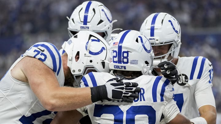 Sep 14, 2025; Indianapolis, Indiana, USA; Indianapolis Colts running back Jonathan Taylor (28) celebrates with his teammates after rushing for a touchdown during a game against the Denver Broncos at Lucas Oil Stadium at Lucas Oil Stadium. 