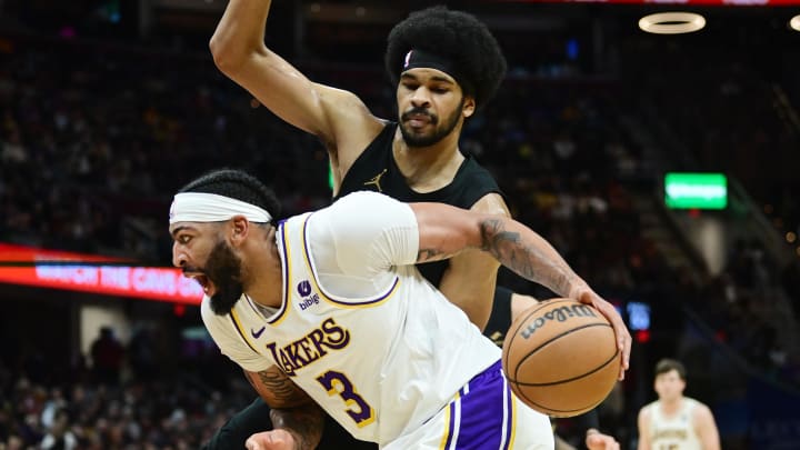 Nov 25, 2023; Cleveland, Ohio, USA; Cleveland Cavaliers guard Caris LeVert (3) drives to the basket against Cleveland Cavaliers center Jarrett Allen (31) during the second half at Rocket Mortgage FieldHouse. Mandatory Credit: Ken Blaze-USA TODAY Sports
