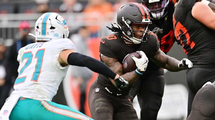 Oct 19, 2025; Cleveland, Ohio, USA; Cleveland Browns running back Quinshon Judkins (10) rushes against Miami Dolphins safety Ashtyn Davis (21) during the second half at Huntington Bank Field. Mandatory Credit: Ken Blaze-Imagn Images Oct 19, 2025; Cleveland, Ohio, USA; Cleveland Browns running back Quinshon Judkins (10) rushes against Miami Dolphins safety Ashtyn Davis (21) during the second half at Huntington Bank Field. Mandatory Credit: Ken Blaze-Imagn Images