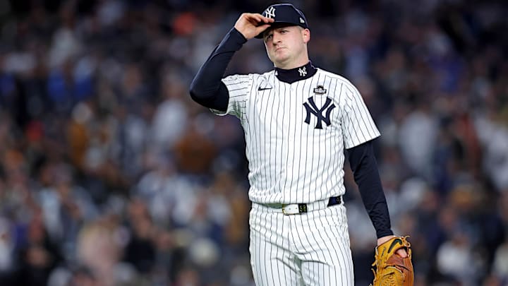 Oct 28, 2024; New York, New York, USA; New York Yankees pitcher Clarke Schmidt (36) reacts after getting the last out against the Los Angeles Dodgers in the top of the first inning in game three of the 2024 MLB World Series at Yankee Stadium. 
