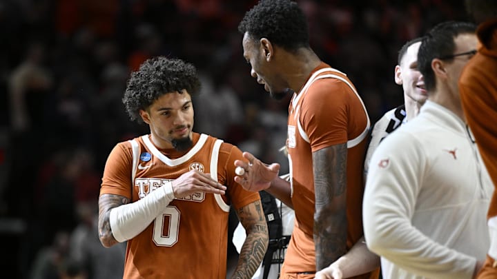 Texas Longhorns guard Jordan Pope celebrates with forward Nic Codie (10) after defeating the Gonzaga Bulldogs during a second round game of the men's 2026 NCAA Tournament at Moda Center. Texas Longhorns guard Jordan Pope celebrates with forward Nic Codie (10) after defeating the Gonzaga Bulldogs during a second round game of the men's 2026 NCAA Tournament at Moda Center.