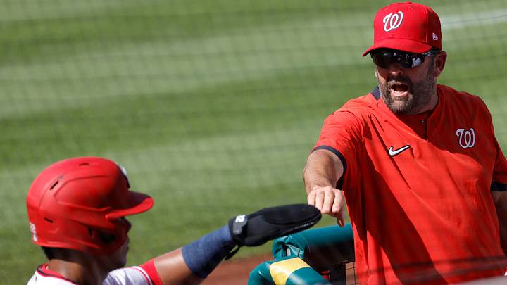 Jun 30, 2021; Washington, District of Columbia, USA; Washington Nationals left fielder Juan Soto (L) celebrates with Nationals hitting coach Kevin Long (R) after scoring a run against the Tampa Bay Rays in the first inning at Nationals Park. Mandatory Credit: Geoff Burke-USA TODAY Sports